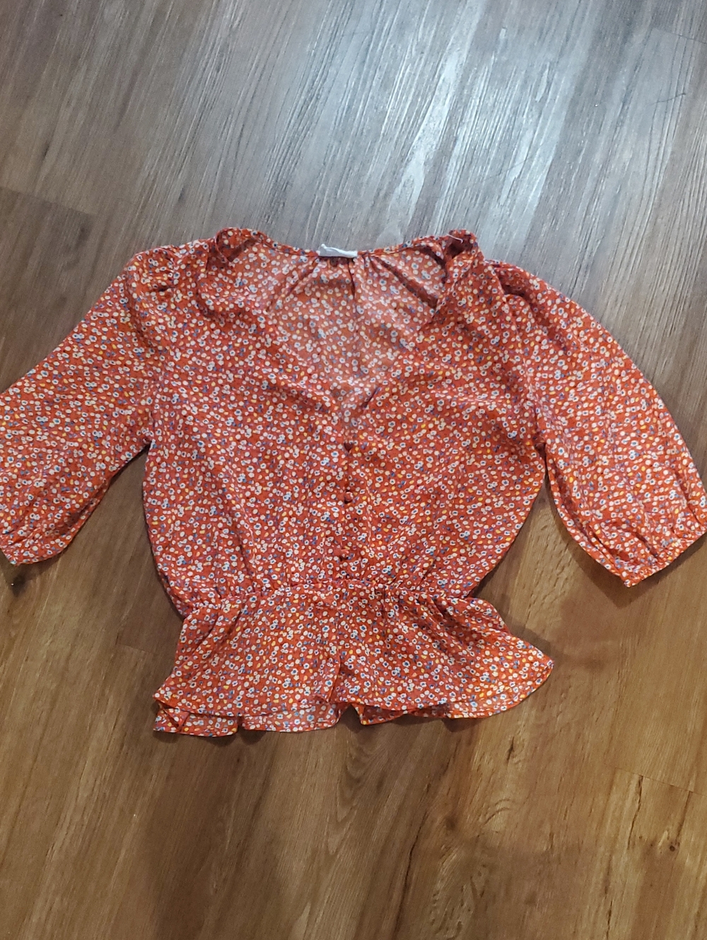 Sienna Sky Orange Floral Ruffle Peplum Blouse